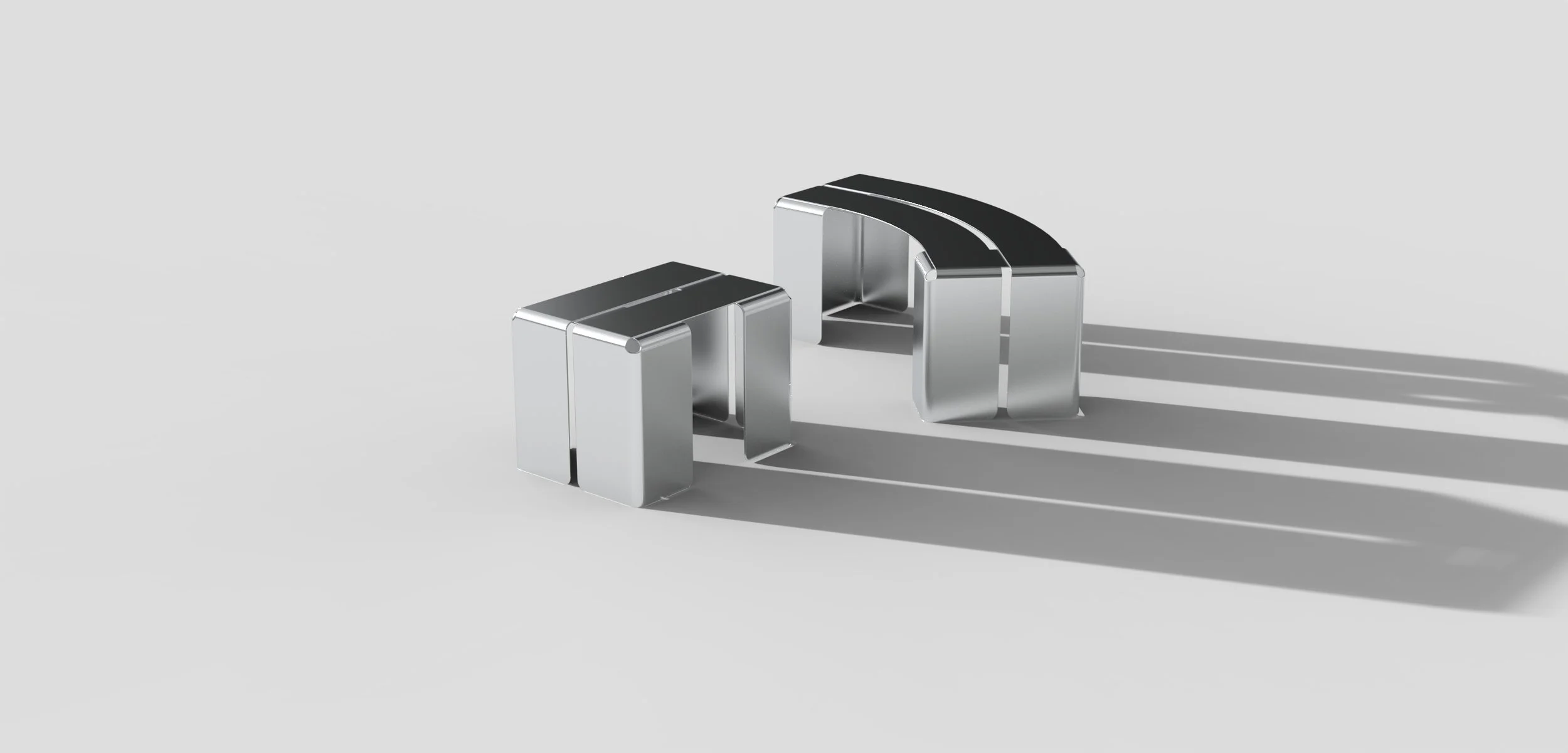 Two modern silver and black chairs with shadows cast on a light gray background.