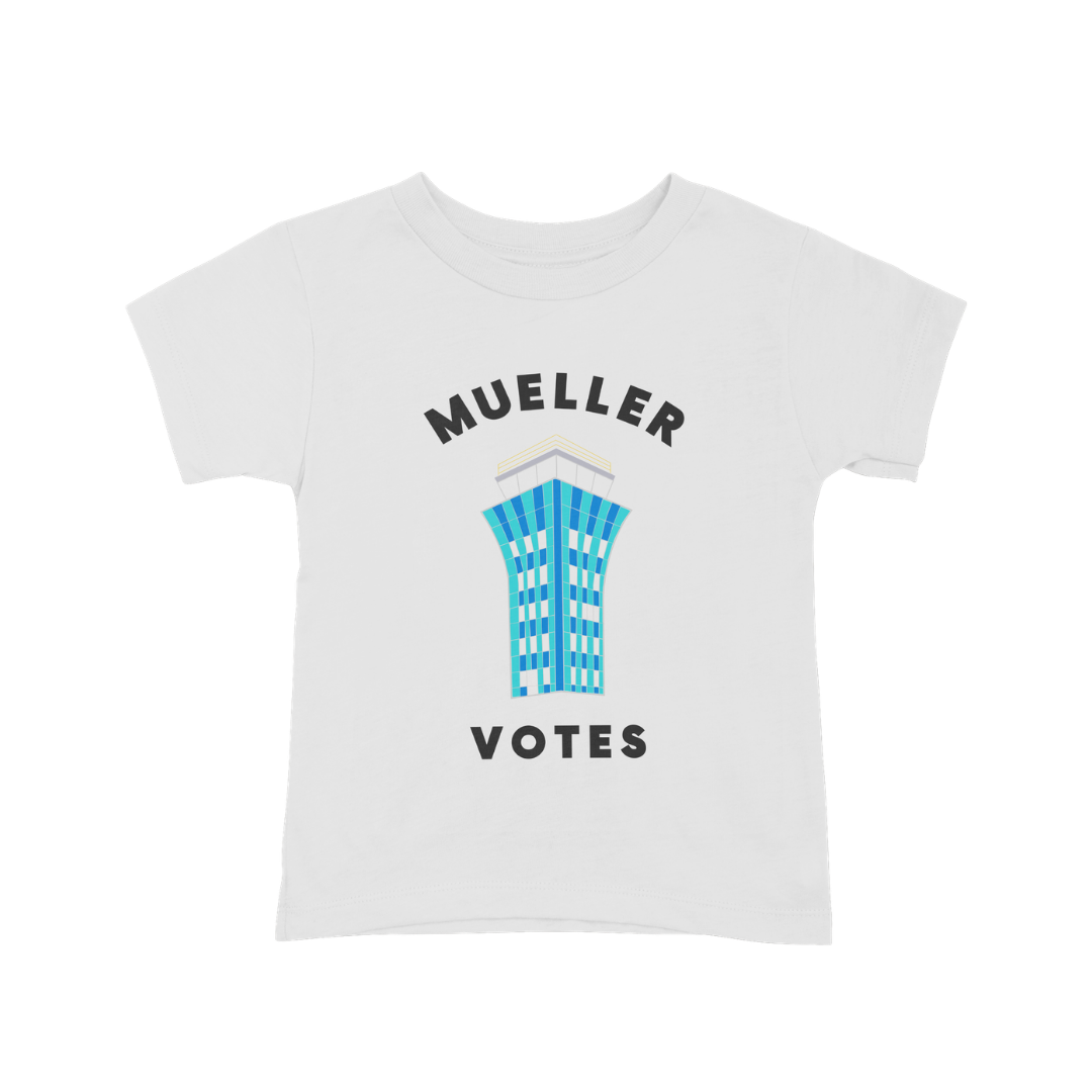 White T-shirt with a graphic of a tall blue glass building in the center, with the words "Mueller Votes" written above and below the building.