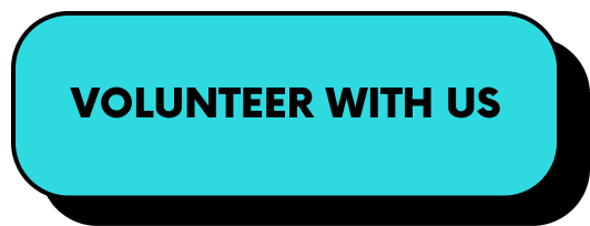 A cyan sign with black text that says 'Volunteer With Us'.