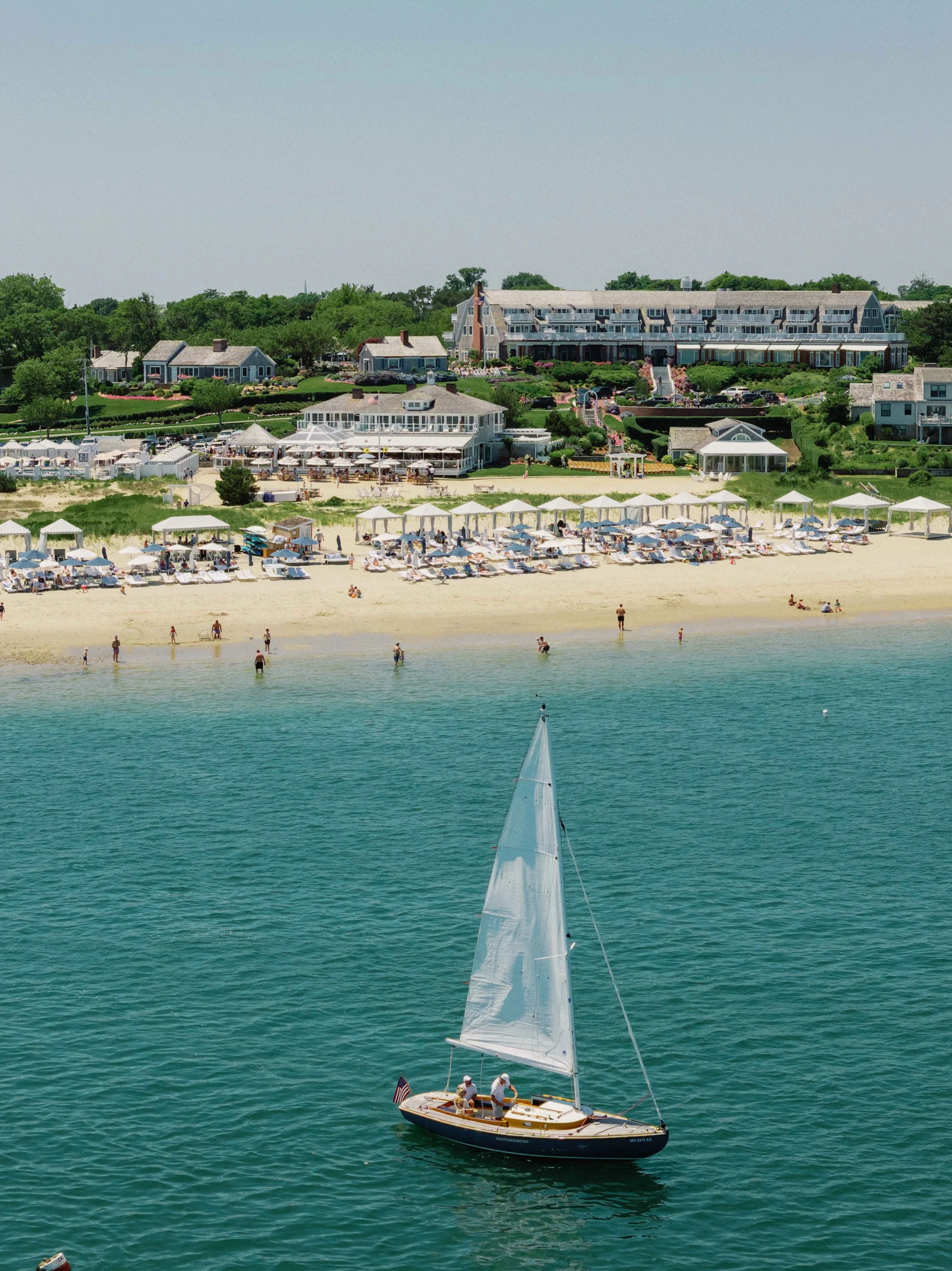 Aerial view of the Massachusetts coast with a sailboat