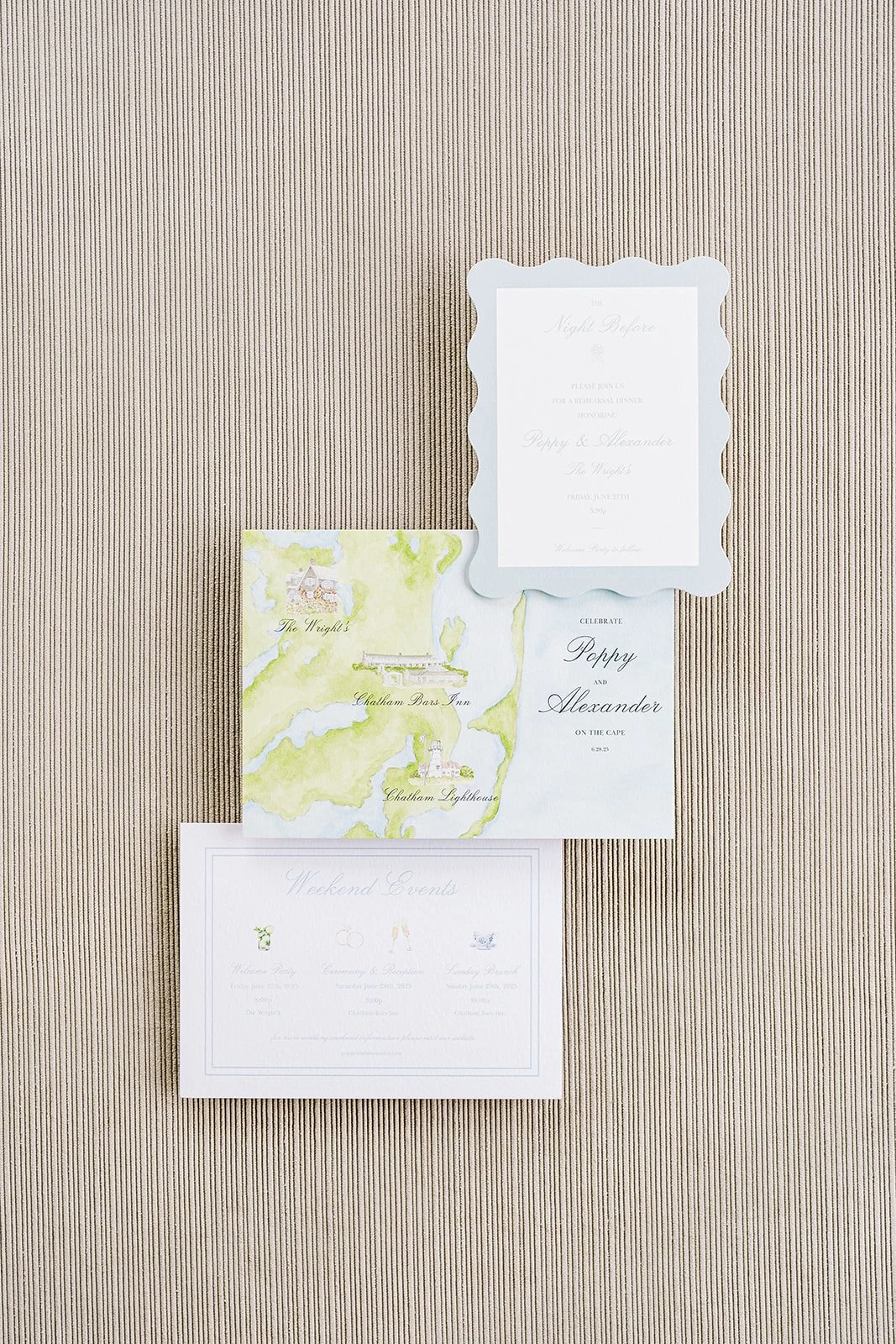 Custom wedding watercolor map with two other wedding stationery pieces on a neutral background
