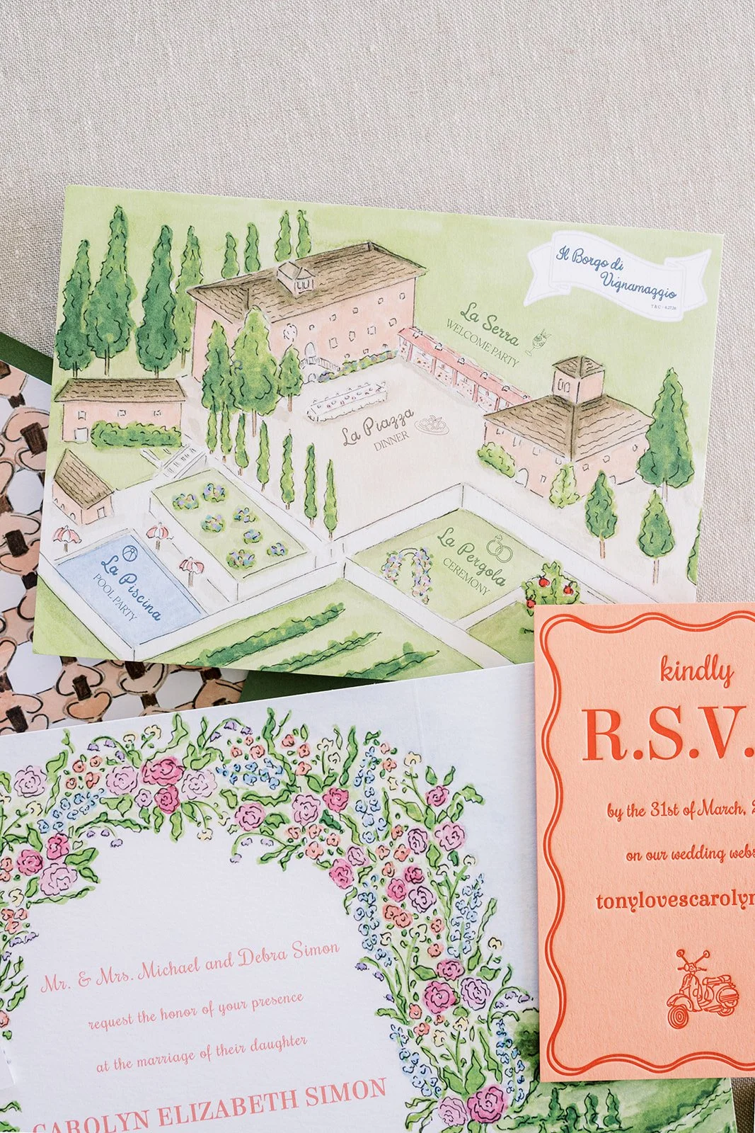 Tuscany wedding invitation suite with orange and green designs and a hand-painted watercolor map
