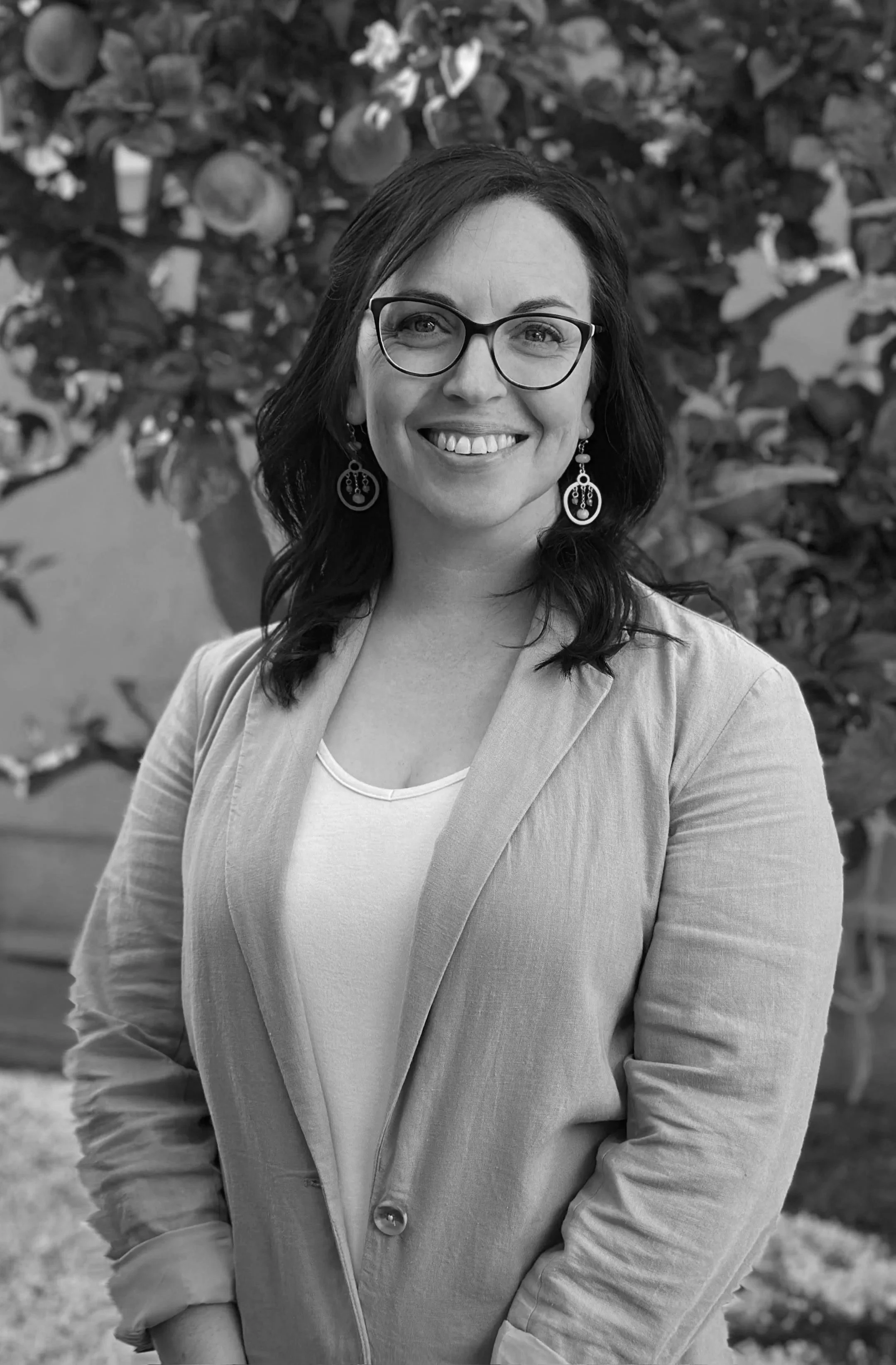 motherhood therapist smiling with glasses