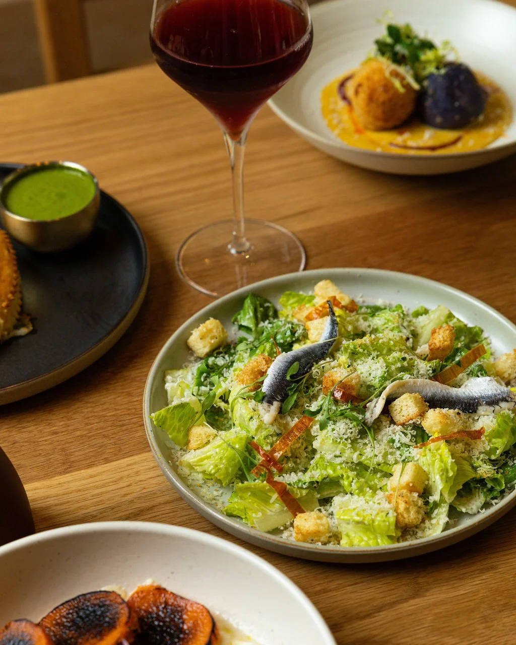 Casa Sofia salad, wine and other dishes