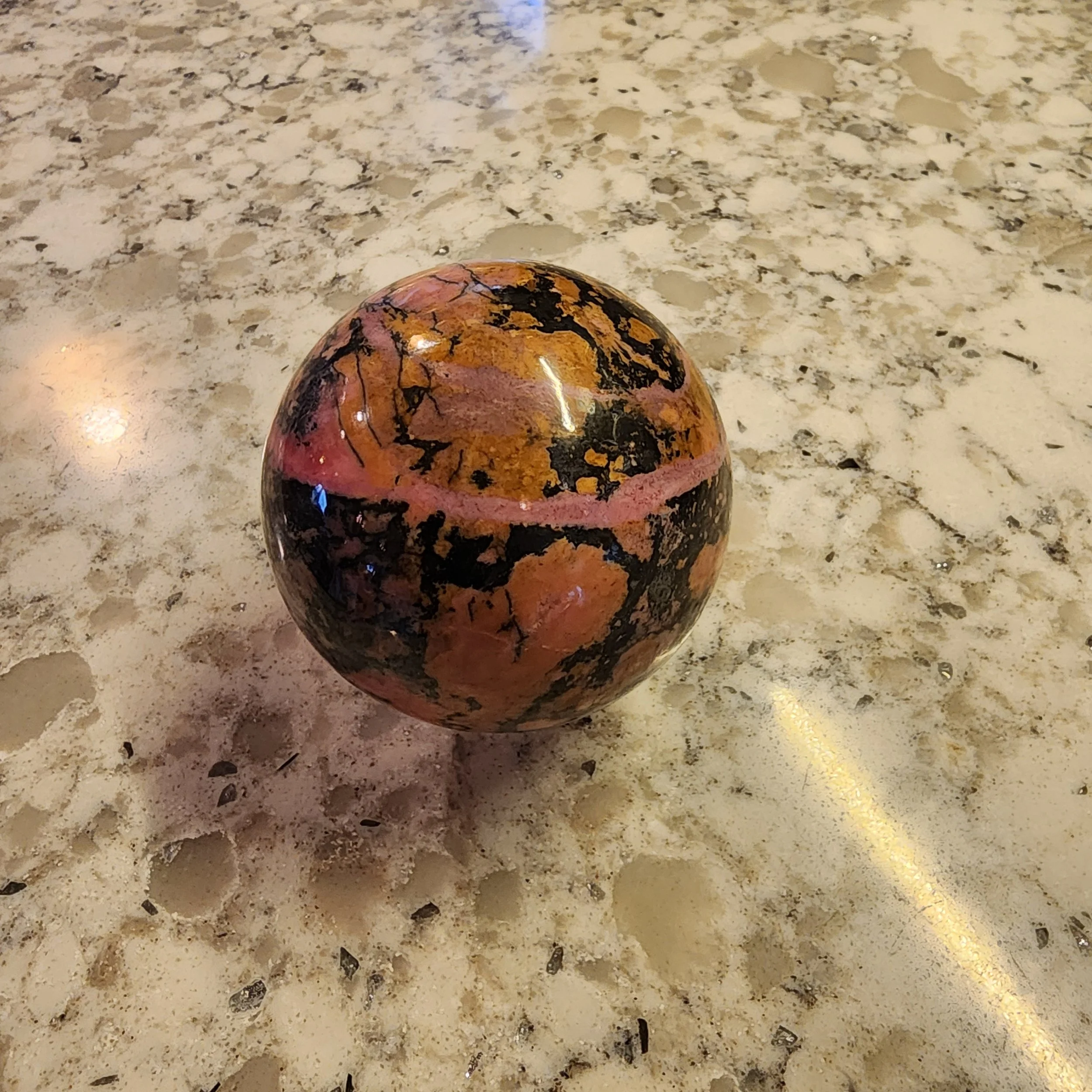 Polished Rhodonite Sphere