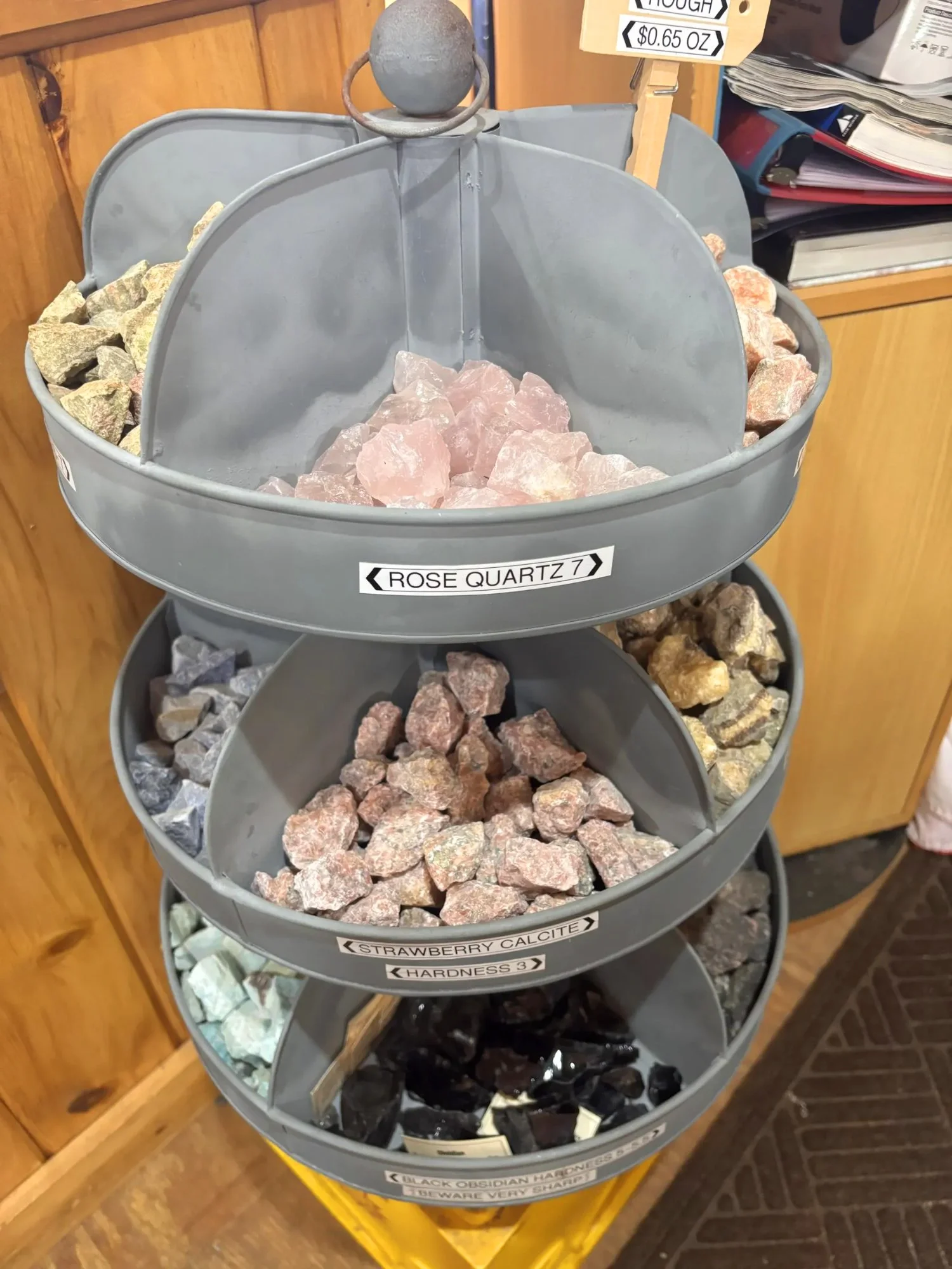 display-rough-rose-quartz-strawberry-calcite-obsidian-tiered-bucket-display-freds-rock-shop-putney-vt.webp