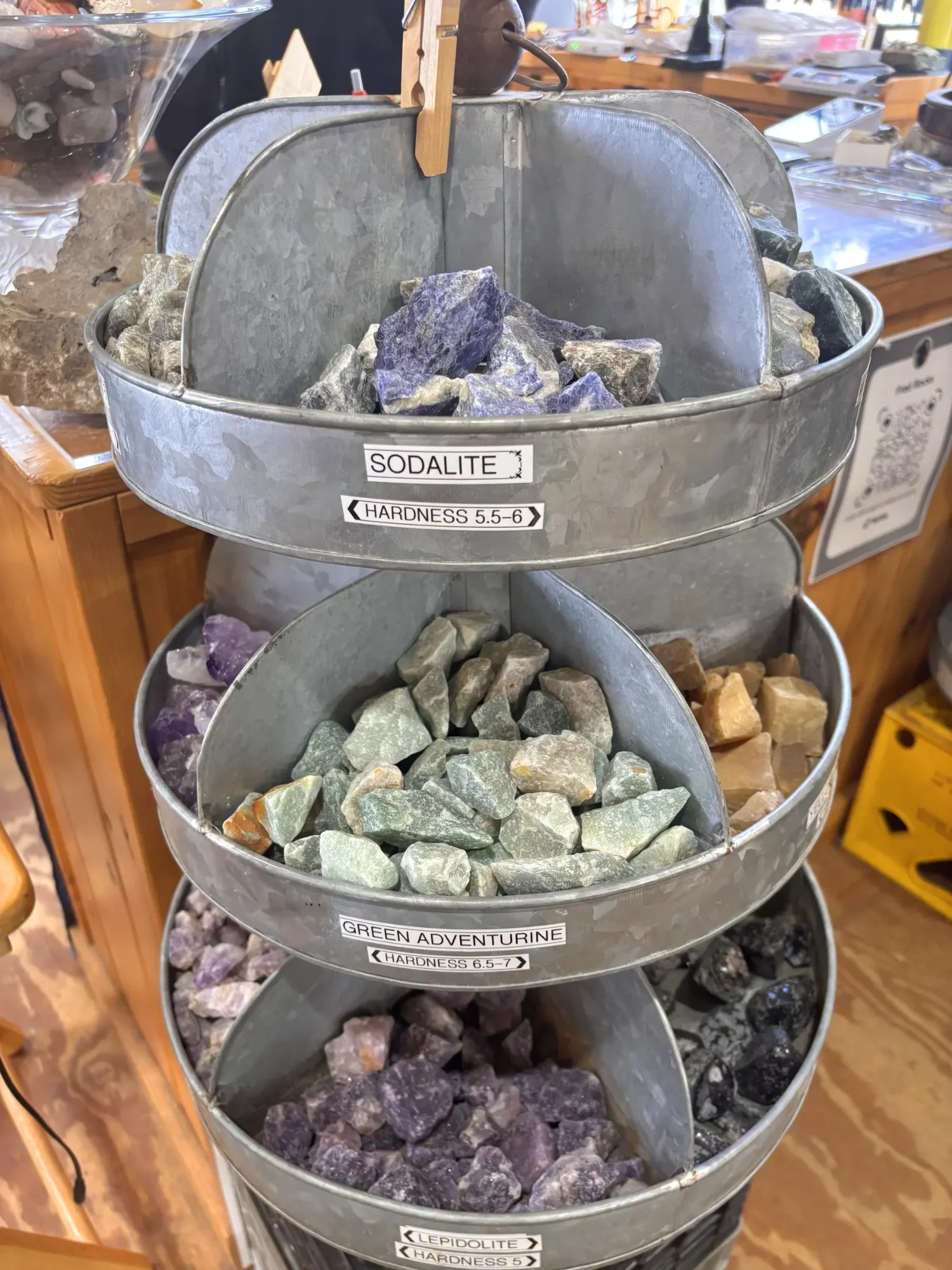 display-rough-sodalite-green-adventurine-lepidolite-tiered-bucket-display-freds-rock-shop-putney-vt.webp