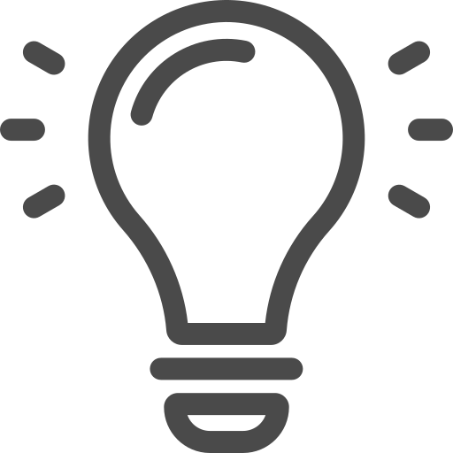 Black and white icon of a lit light bulb.