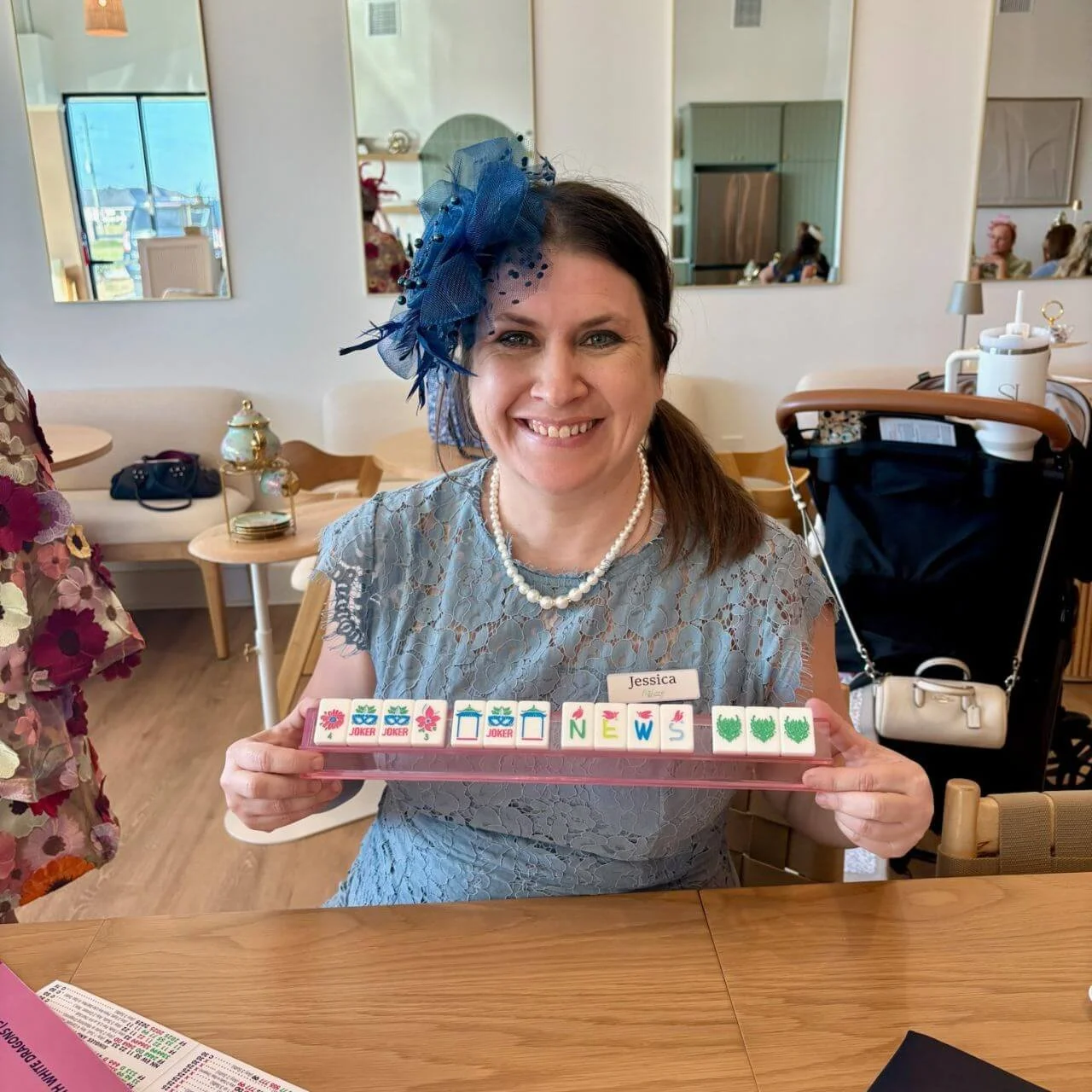 Woman dressed up for a Tea party playing Mahjong
