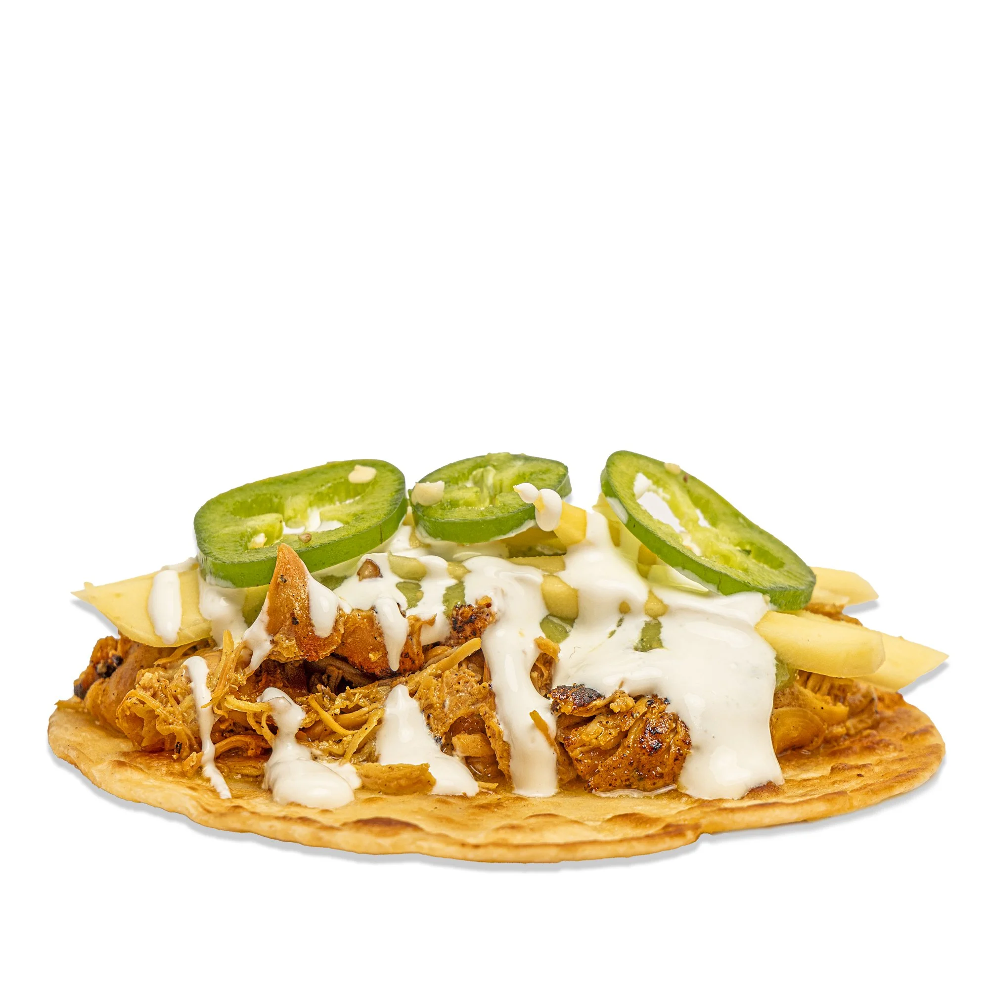 Tacos with shredded meat, sliced jalapeños, chopped banana peppers, shredded cheese, and drizzled with sour cream, served on a tortilla.