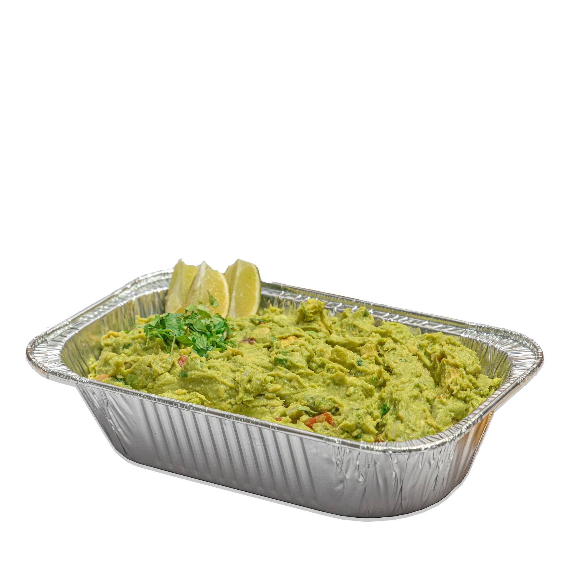 Aluminum tray of guacamole with lemon wedges and fresh cilantro garnish.