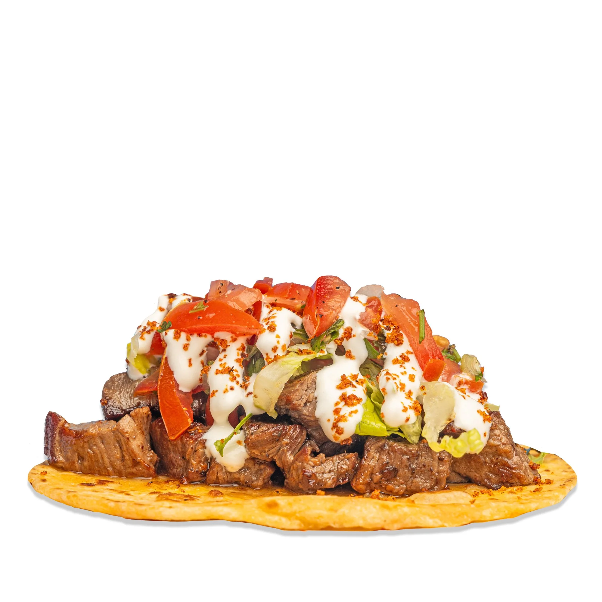 Street taco with grilled beef, lettuce, tomatoes, sour cream, and salsa on a corn tortilla