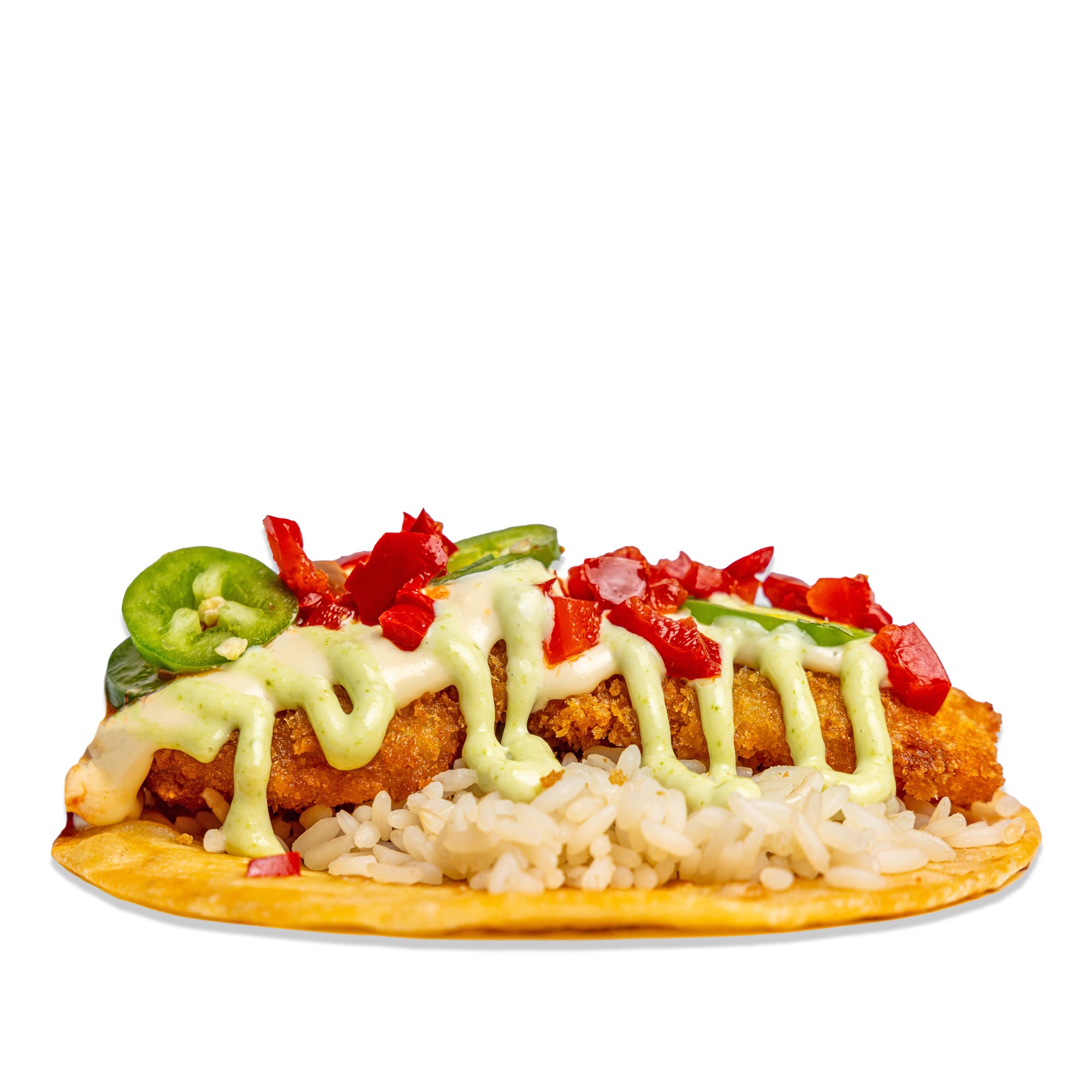 A fried fish taco on a corn tortilla topped with rice, green sauce, red chopped peppers, and sliced jalapenos.
