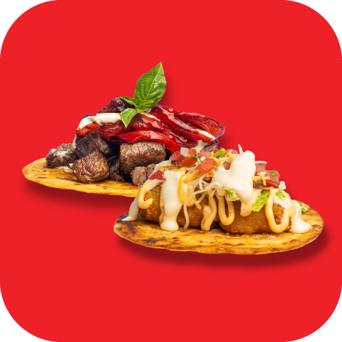 Two tostadas topped with meat, chili peppers, cheese, and vegetables on a red background.