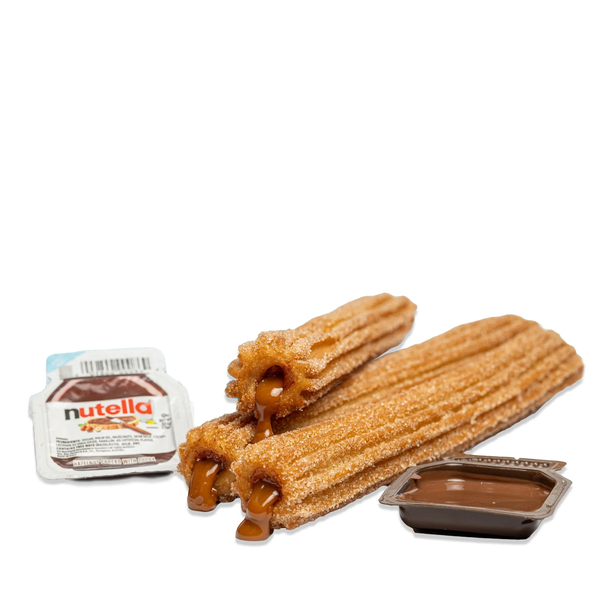 Two churros coated with cinnamon sugar, filled with caramel, with a small container of chocolate sauce and a packet of Nutella hazelnut spread.