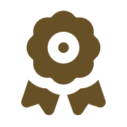 An award ribbon with a gear symbol in the center, colored in brown and black.