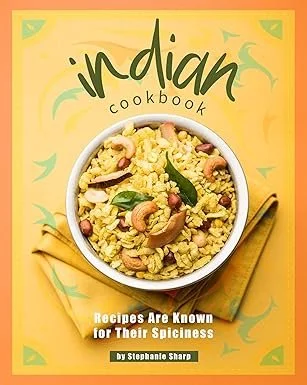 Cover of an Indian cookbook titled 'Indian Cookbook' featuring a bowl of yellow rice with cashews, spices, and green herbs, with a yellow napkin beside it.