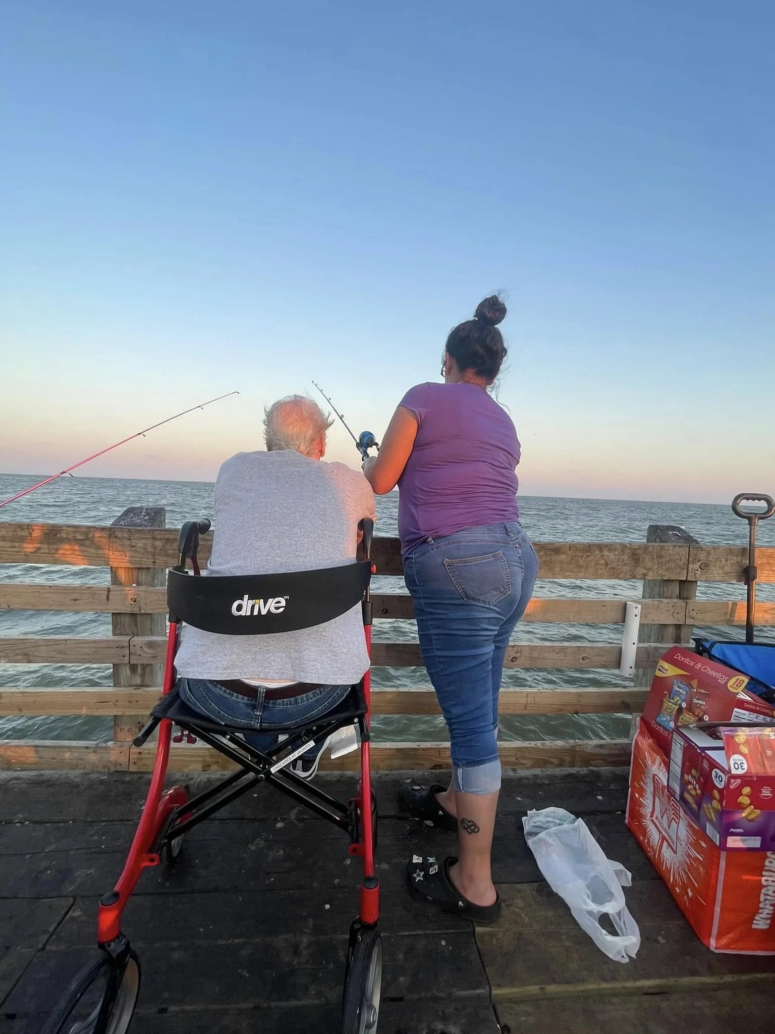 Two people fishing