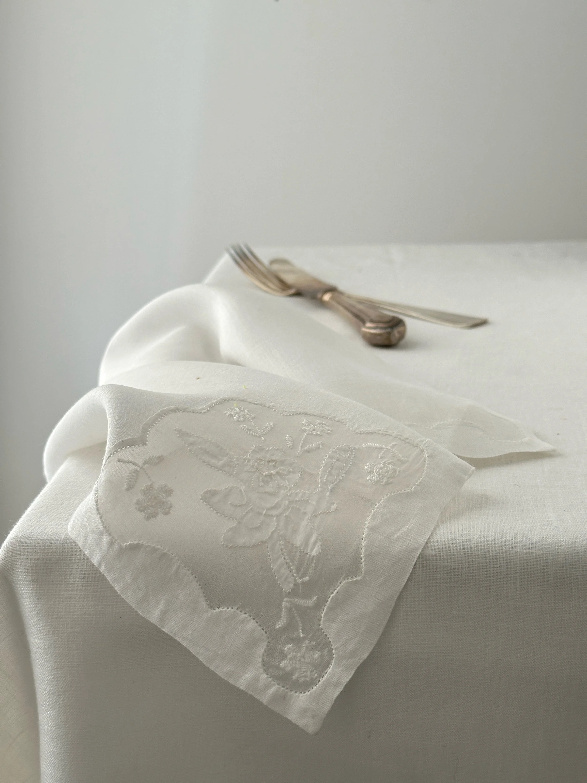 Exquisite very fine white handkerchief linen napkins with delicate edge embroidery