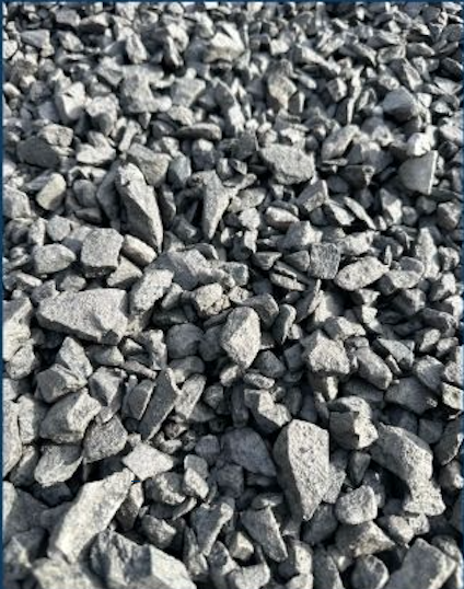 Gray gravel stones scattered on the ground.