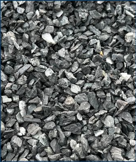 Pile of small gray and black gravel stones.