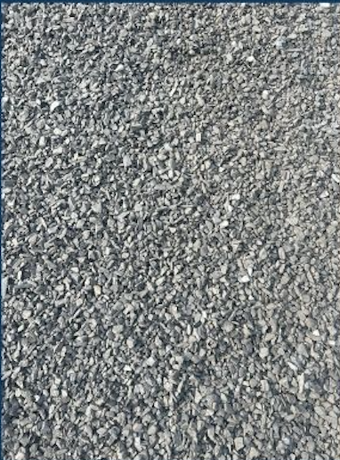 Gravelly dirt or small rocks surface.