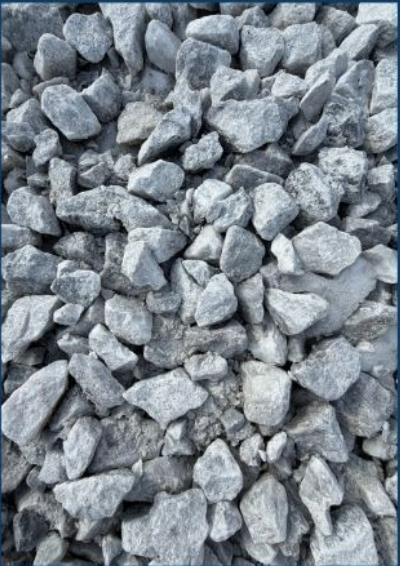 A pile of gray crushed rocks or gravel.