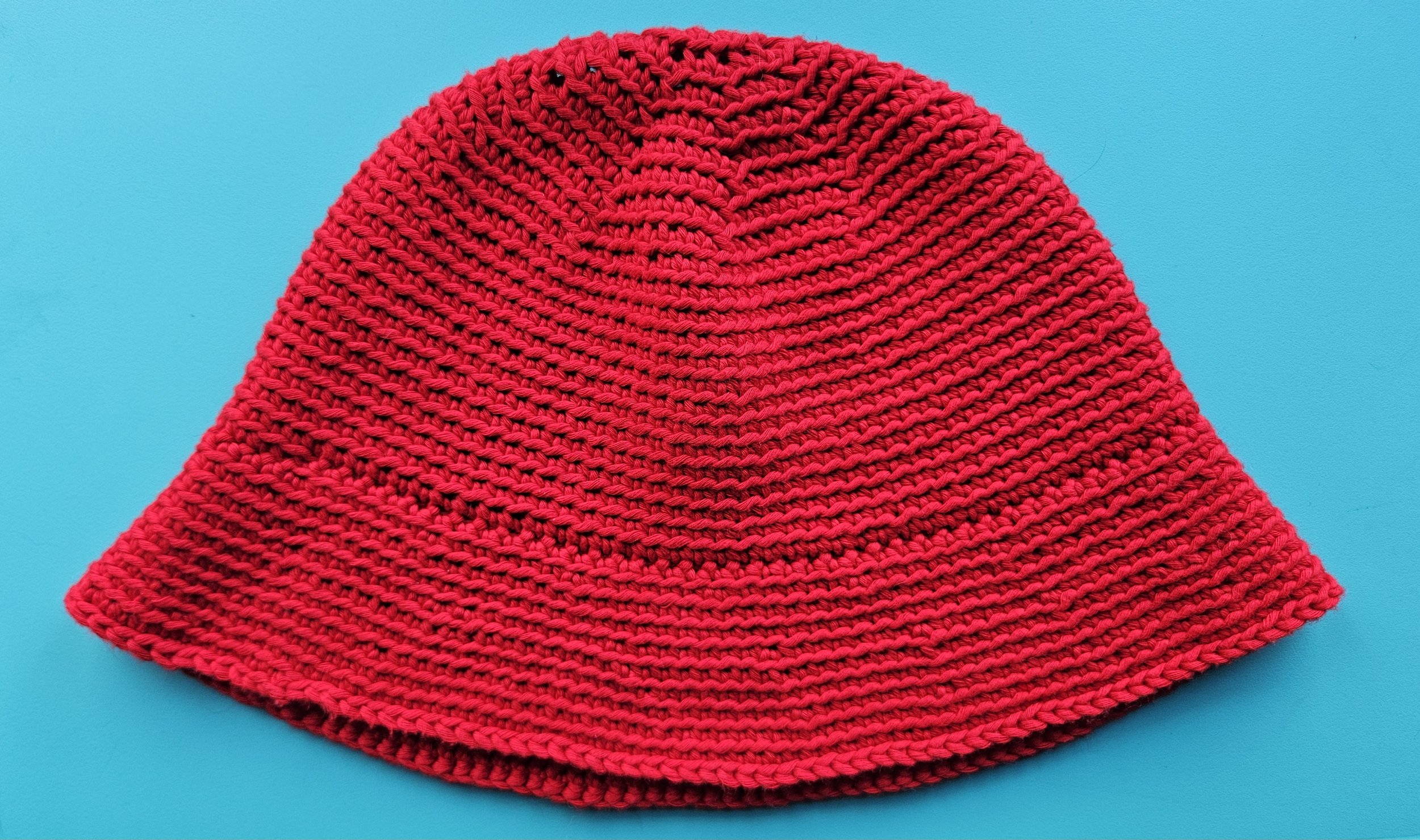 floppy red bucket hat