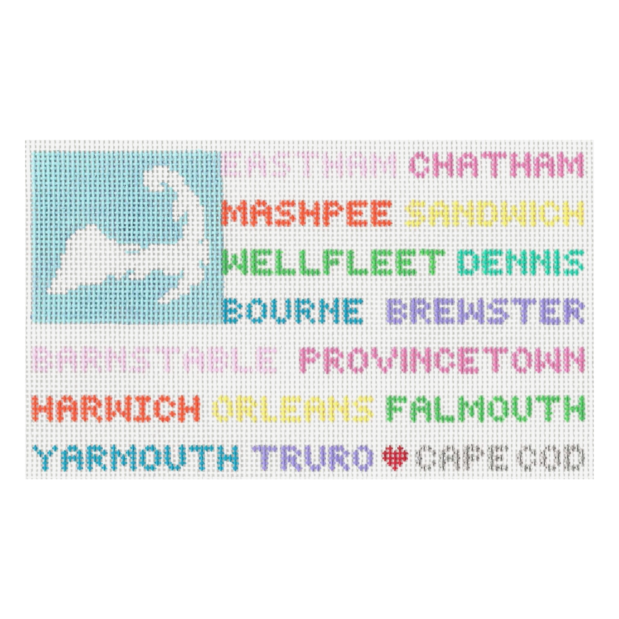 Needlepoint pattern of the American flag in pastel colors and the towns in Cape Cod repeatedly stitched in different colors