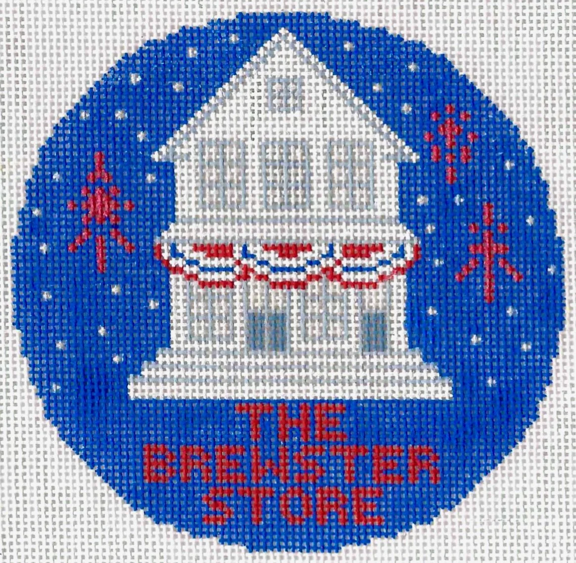 Needlepoint design of the Brewster store in Cape Cod Mass in July.