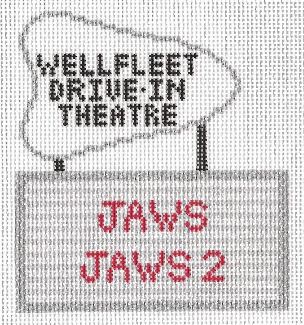 Needlepoint design of a movie sign for Wellfleet Drive In Theater.