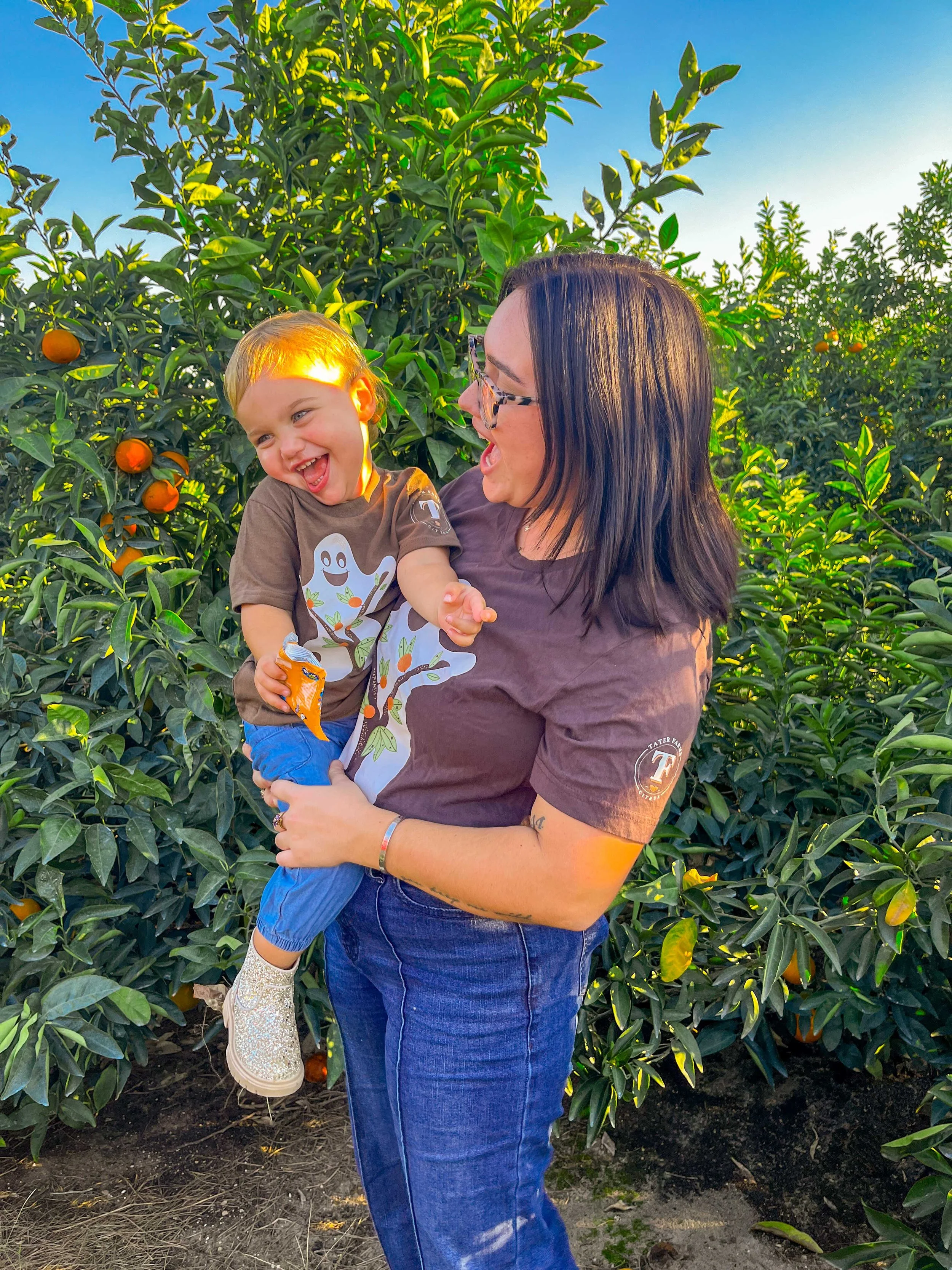 Mother & Daughter Modeling Citrus Ghost Graphic T-shirt in Citrus Grove 2024