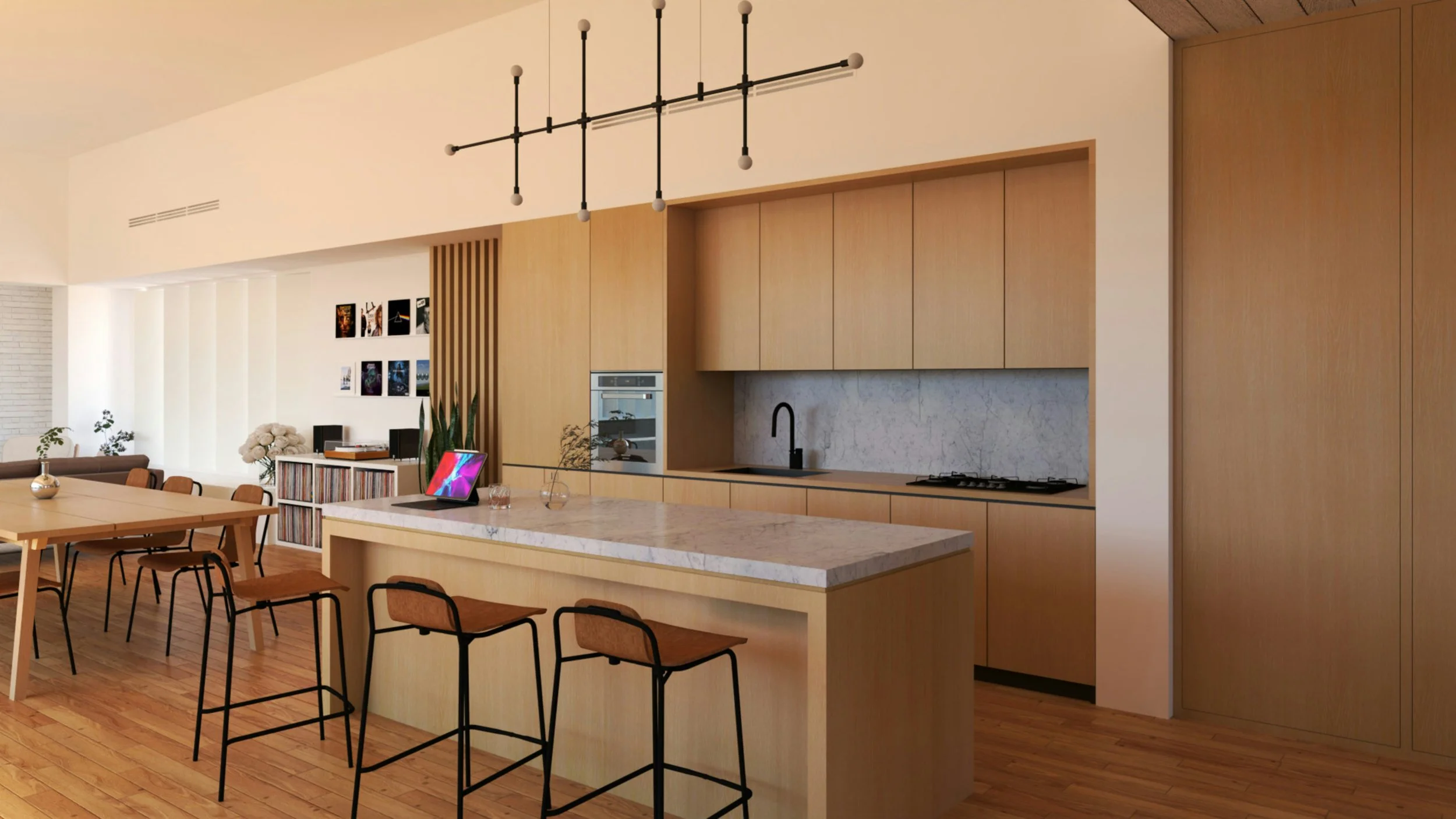 Modern open-concept kitchen and dining area with light wood cabinets, a white marble island, black bar stools, and a dining table with matching chairs. Decor includes a tablet, plants, and wall art.