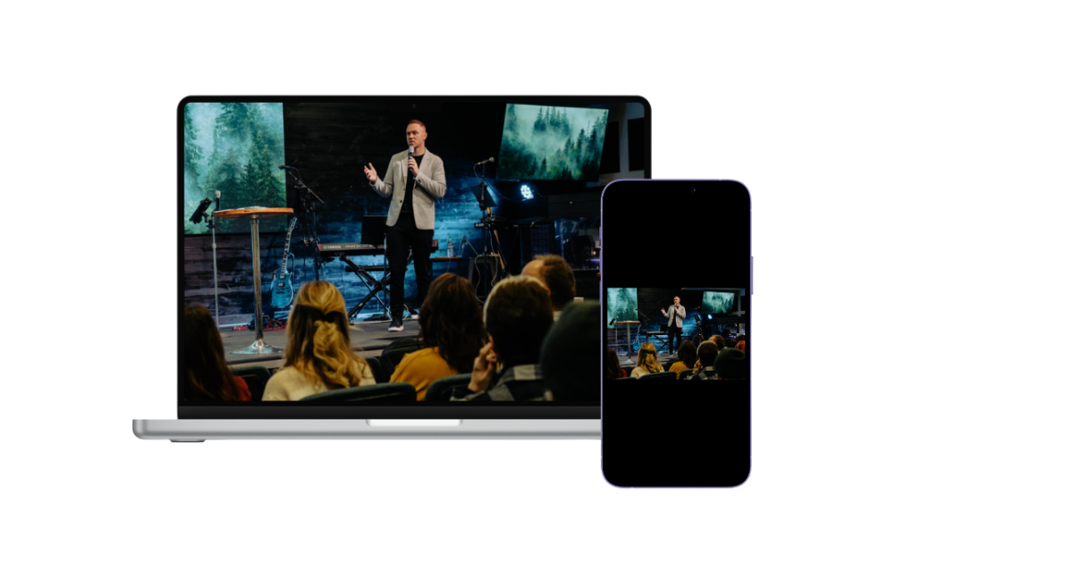 A person giving a presentation on stage at a conference, with a large screen displaying a forest scene behind them, seen on a laptop and smartphone screens in the foreground.