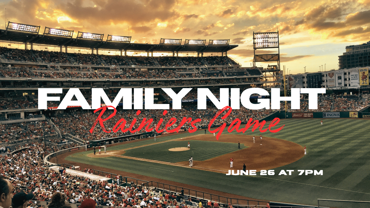 A packed stadium during a baseball game at sunset, with the sky showing orange and yellow clouds, featuring text overlay promoting a Family Night Rainiers Game on June 26 at 7 PM.