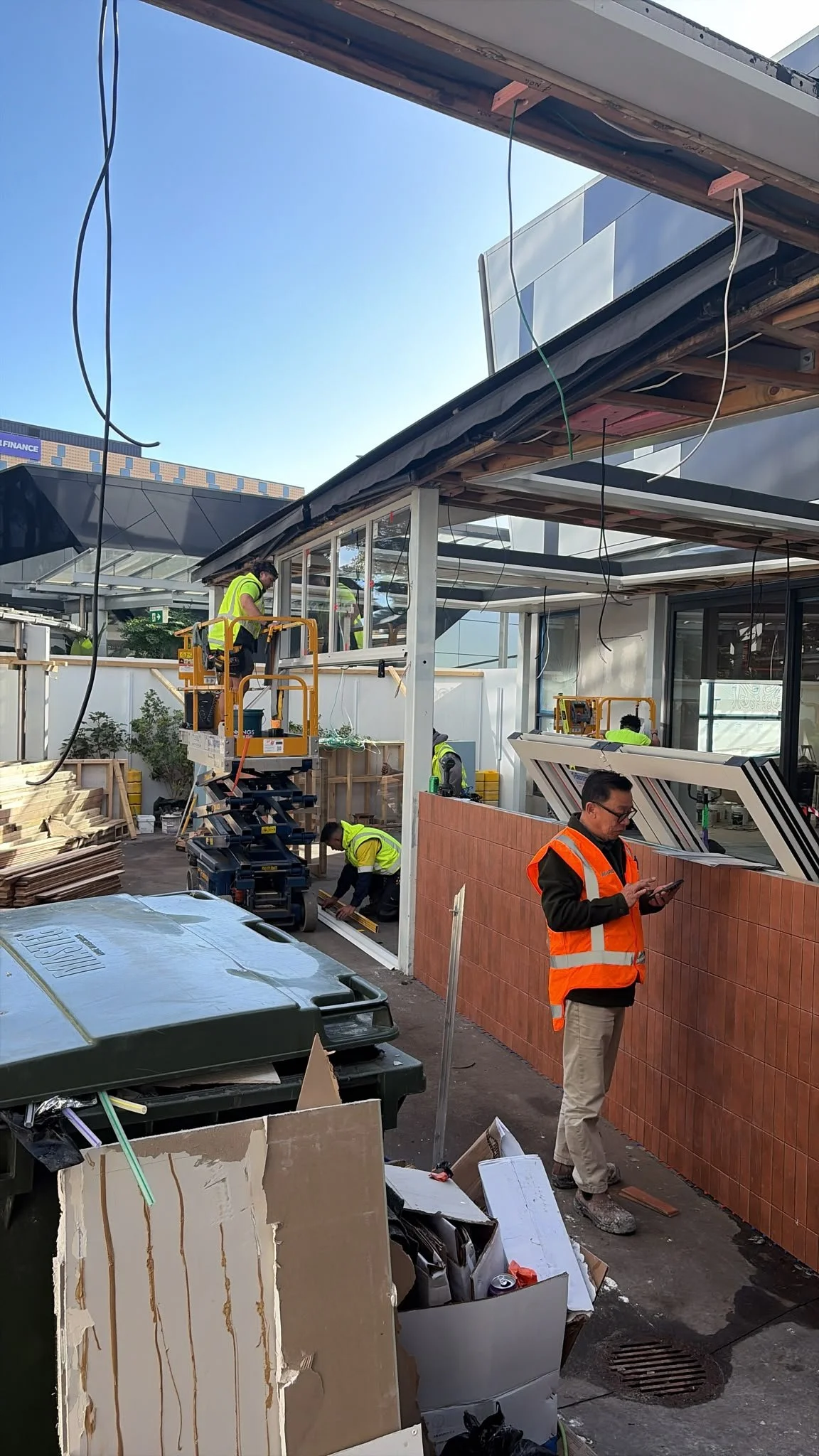 Exterior construction underway at Sports & Rec Bar, with the Form & Finish team managing sub-trades on site.