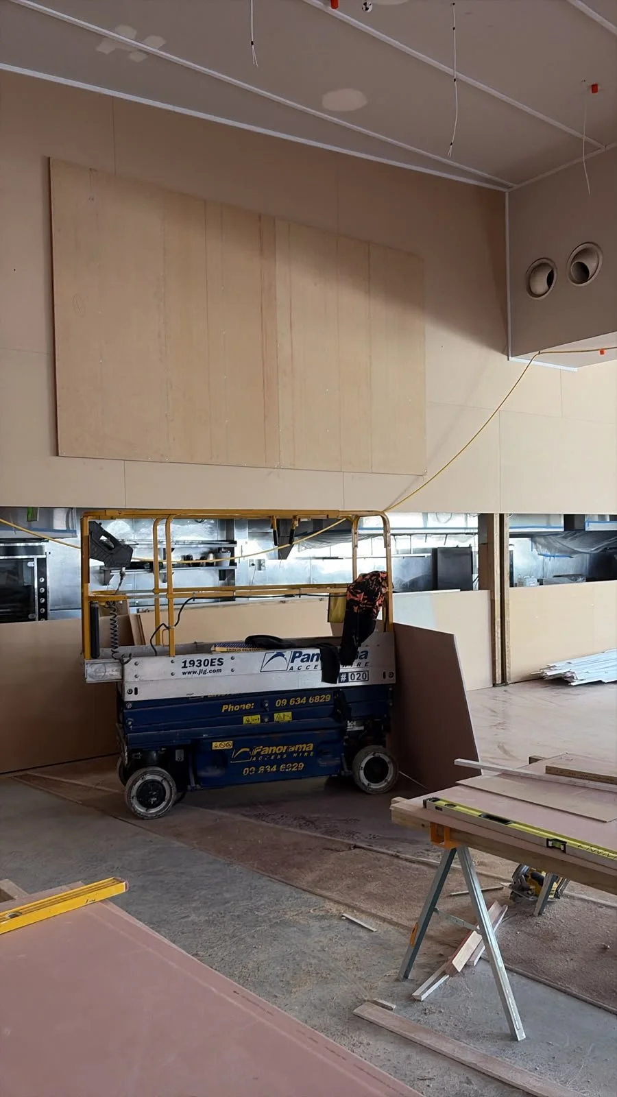 Timber wall panelling and kitchen joinery installation in progress at Sports & Rec Bar.