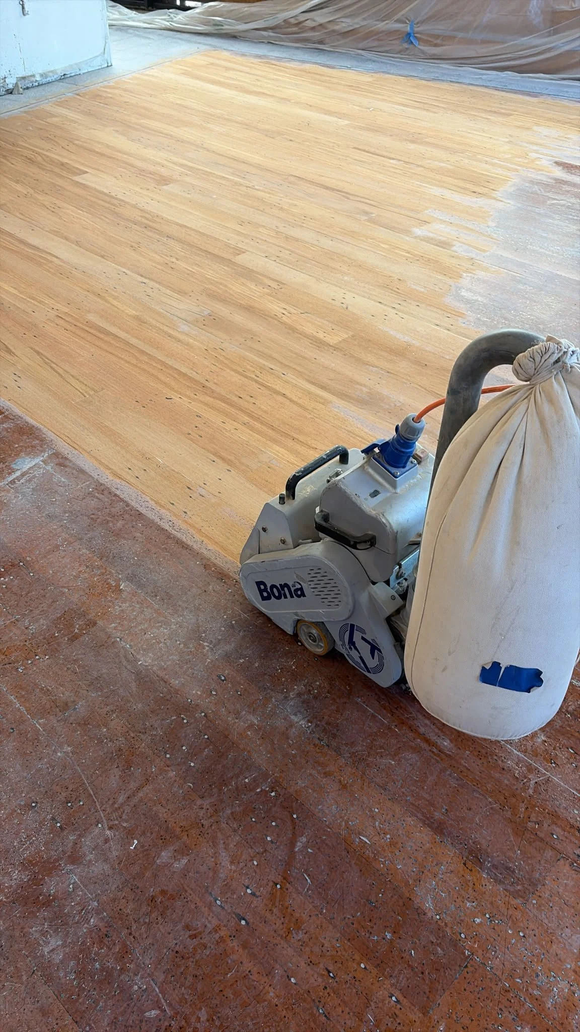 Timber floor sanding underway at Sports & Rec Bar.