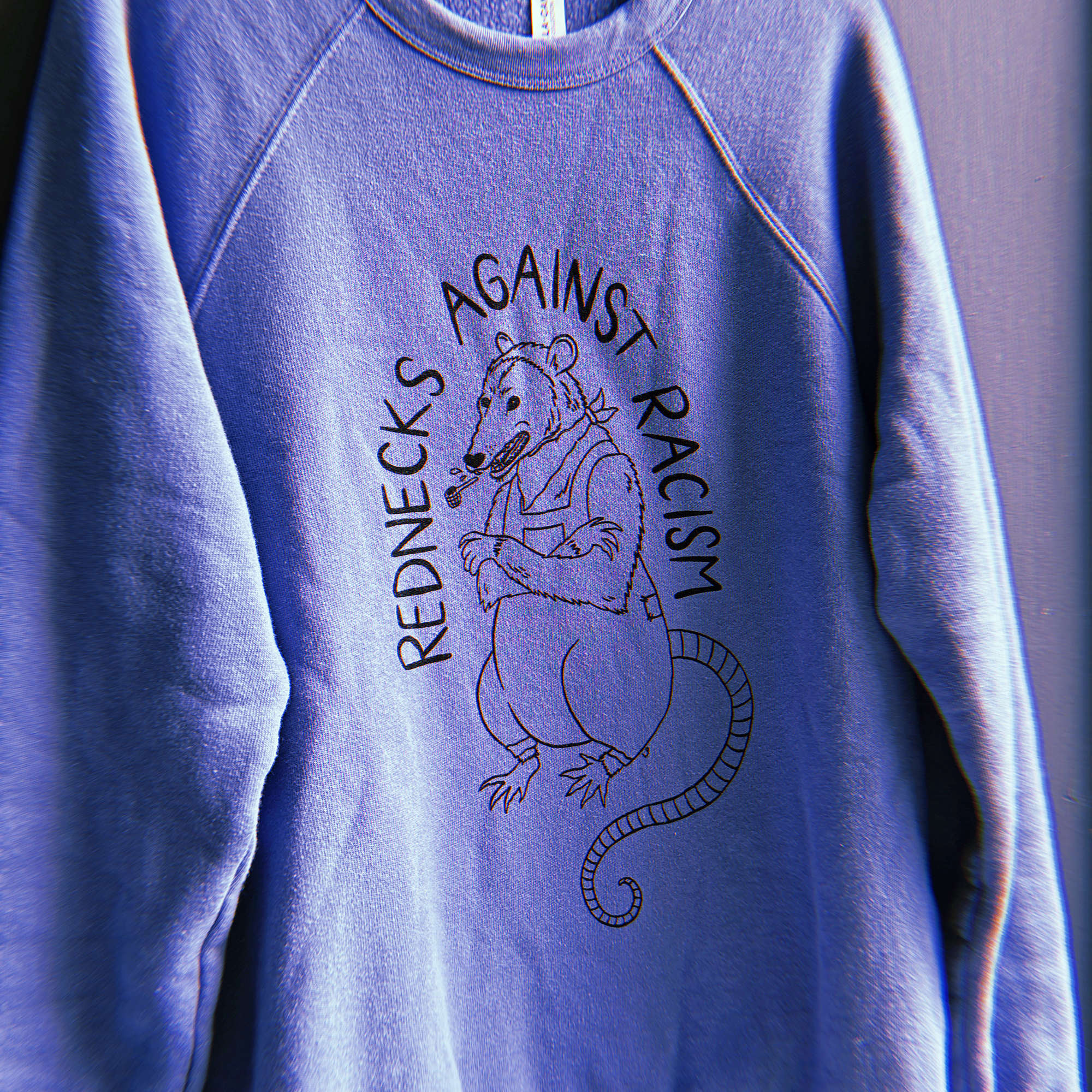 rednecks against racism sweatshirt lavender blue 4.png