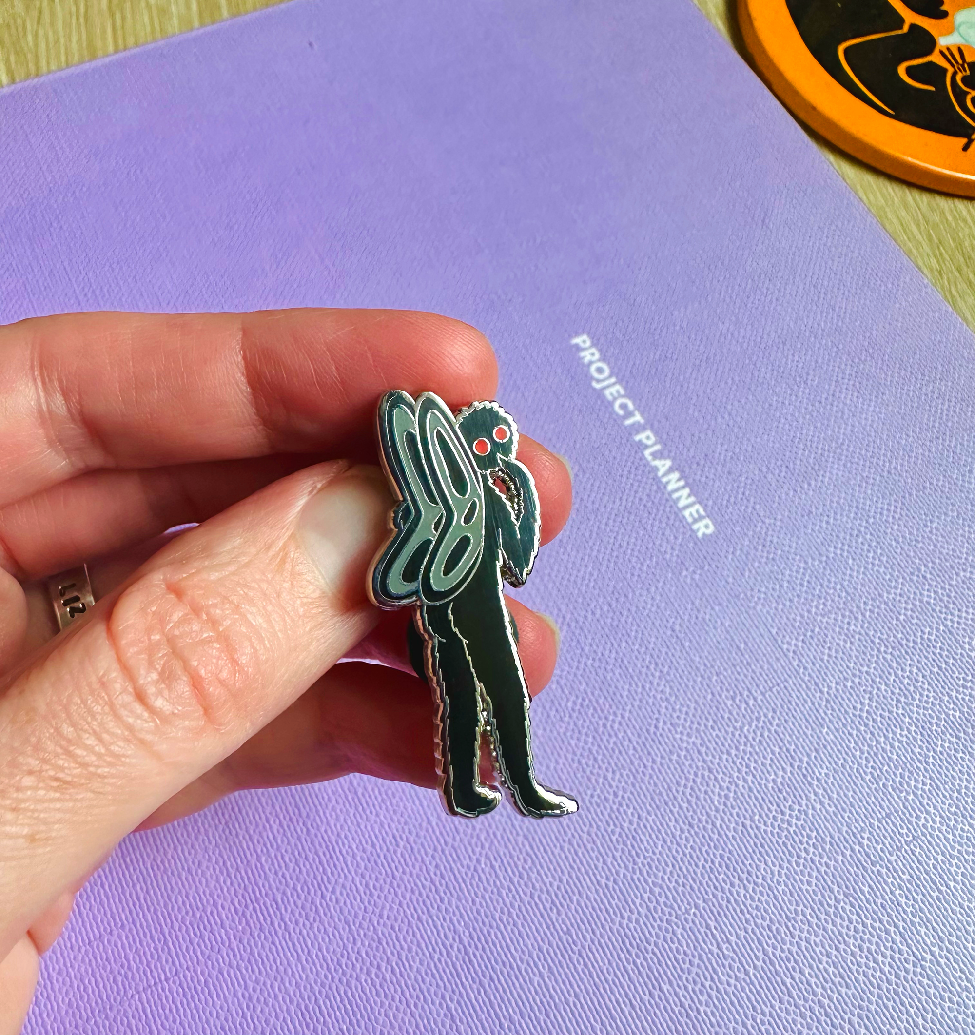 mothman sweet cheeks pin 3.png