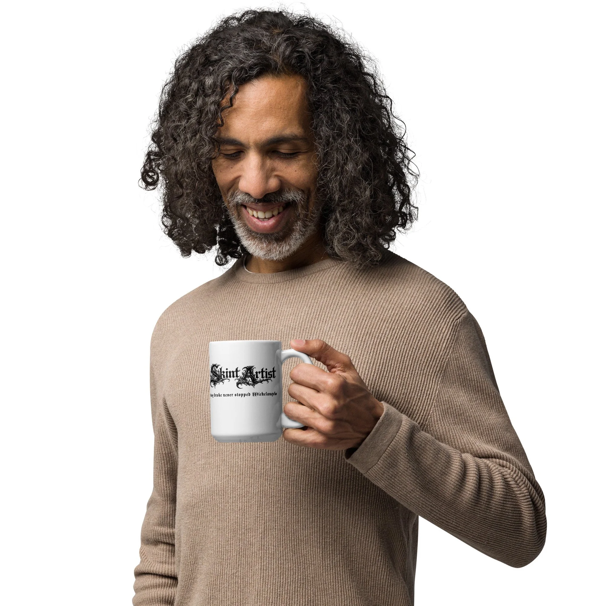 Skint Artist logo mug that holds your favorite coffee, minimalist design to match your kitchen.  Logo is in a unorthodox gothic design over a white background.