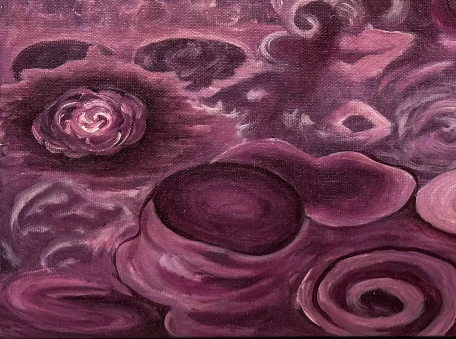 Abstract painting with swirling circular shapes in shades of purple, pink, and black.