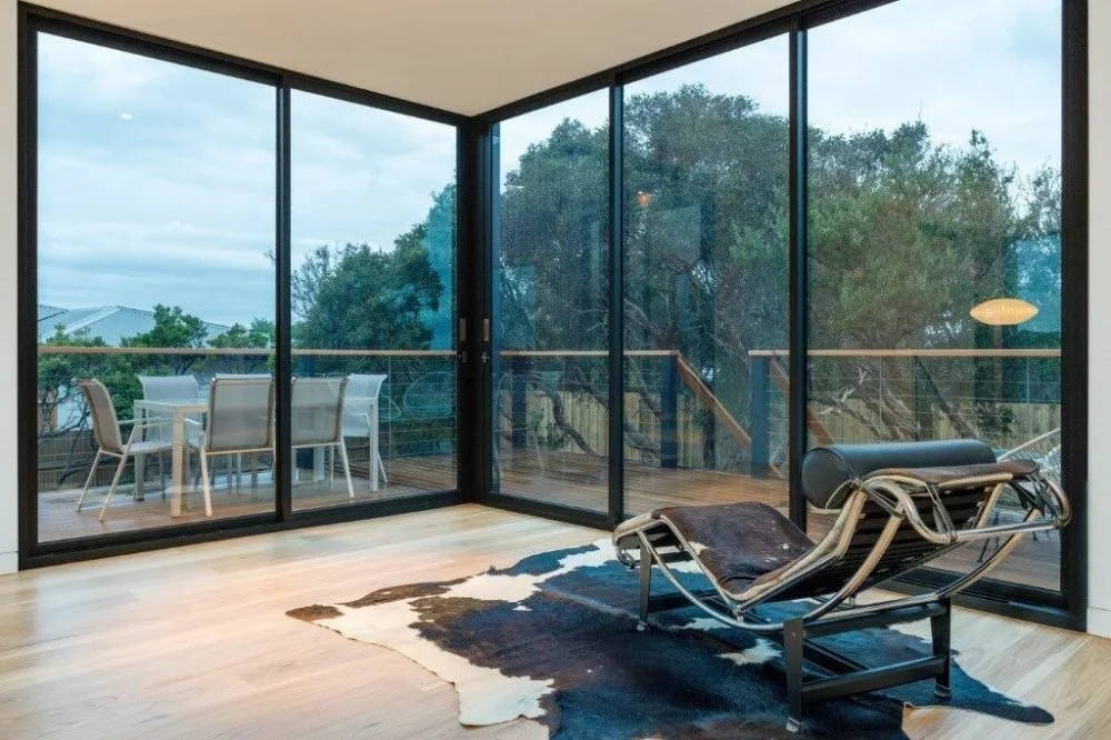 Hansen Living Rye Back Beach Living Room balcony view