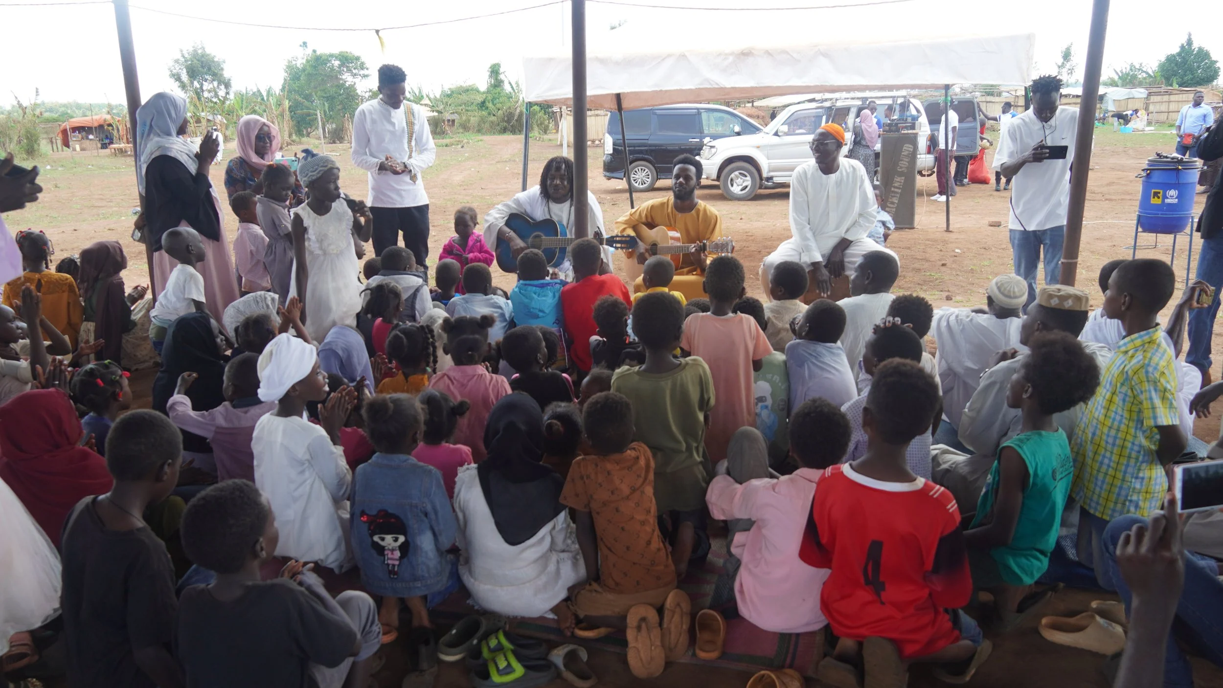 musians playing for the children Kiryandonogo.JPG