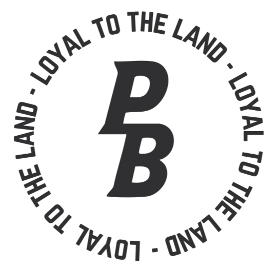 A circular logo with the text 'Loyal to the Land' repeated around the border and a central 'P B' in bold letterings.