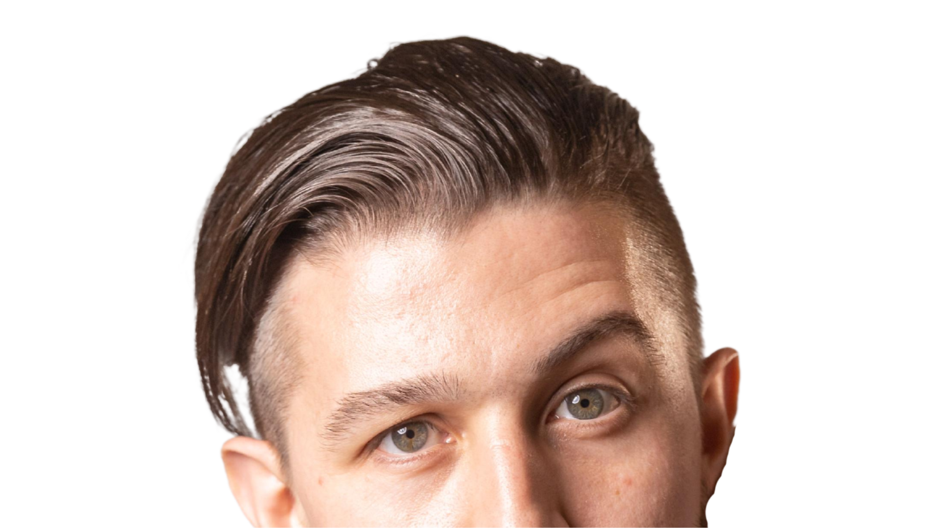 Close-up of a young man's face with stylized brown hair, well-groomed eyebrows, and hazel eyes.