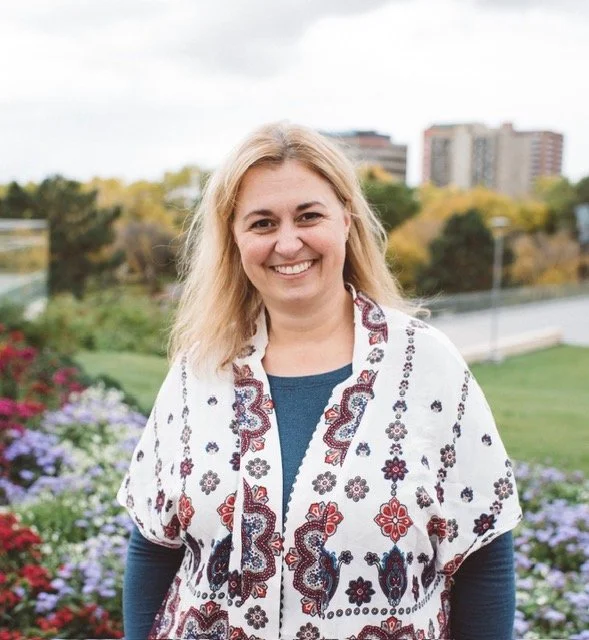 Kari, Canadian Registered Dietitian and founder of Strong Through Menopause, smiling outdoors - helping women navigate perimenopause and menopause through real food and expert advice.