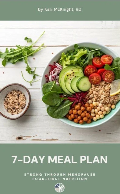 Colourful menopause-supportive grain bowl with cherry tomatoes, cucumber, mixed greens, and quinoa - a recipe from Strong Through Menopause, designed by a Canadian Registered Dietitian.