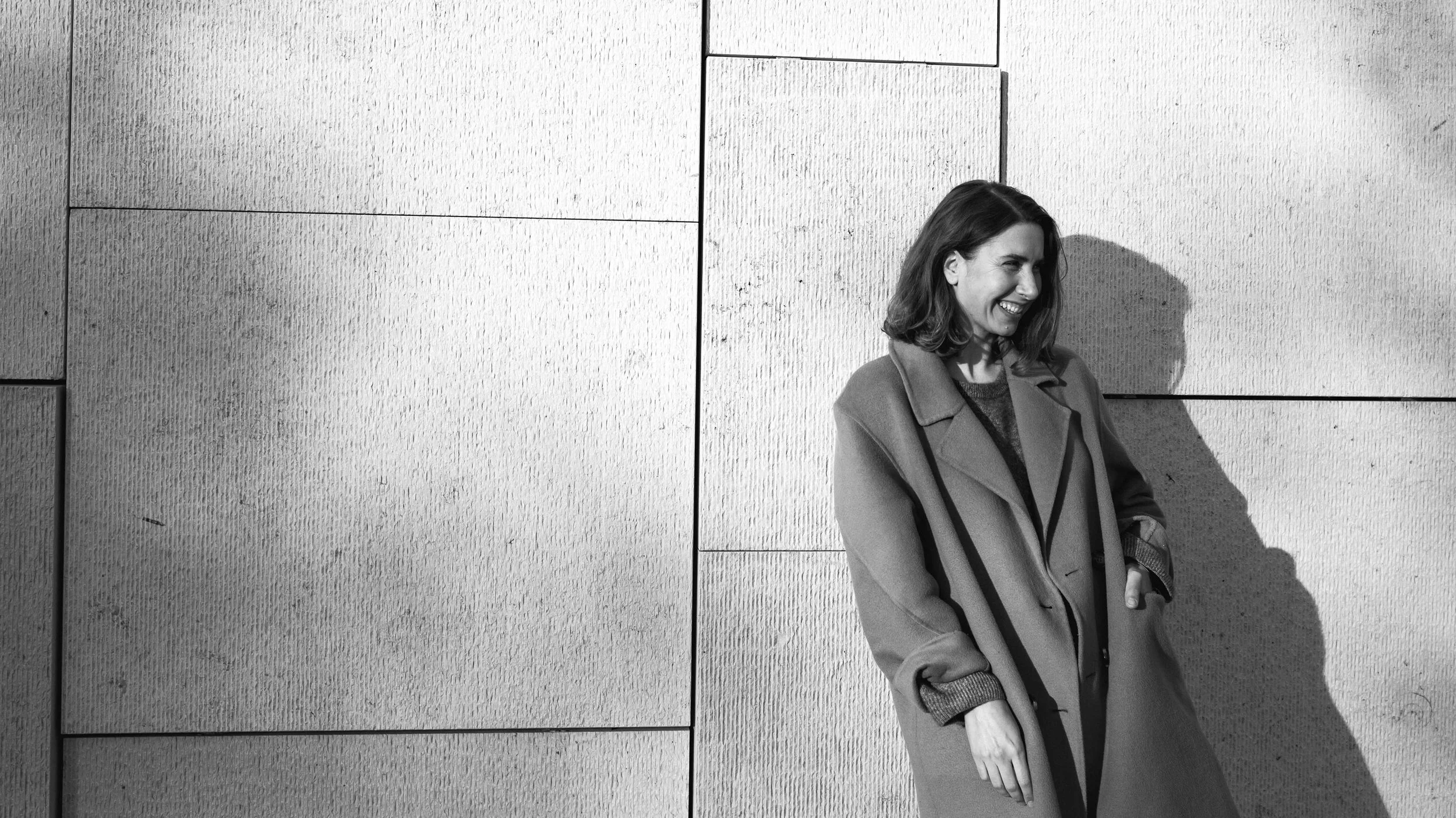 Jennifer Stoppel, Creative Director and brand consultant, photographed in black and white for her About page.