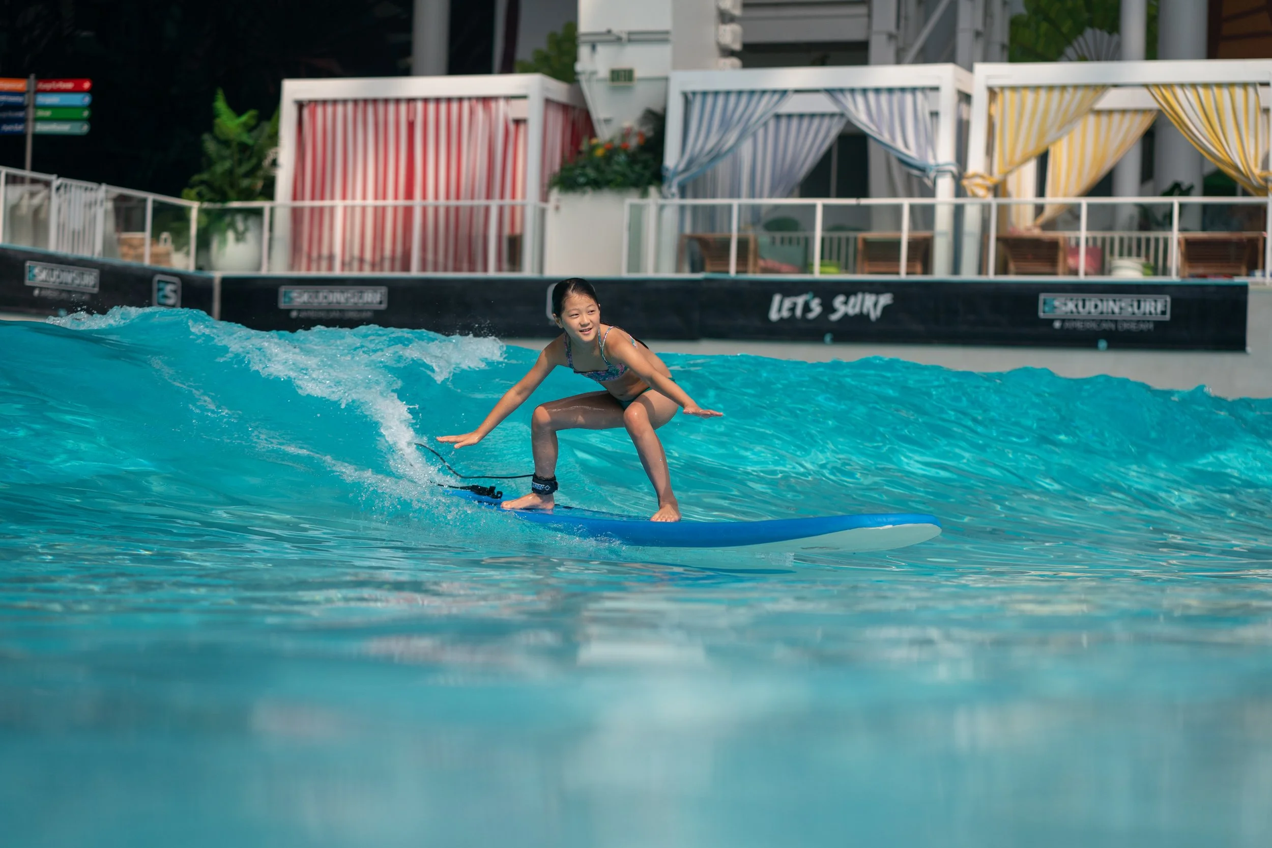 Family enjoying private indoor surf experience